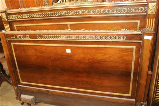 An Empire style parcel gilt bedstead, W.145cm
